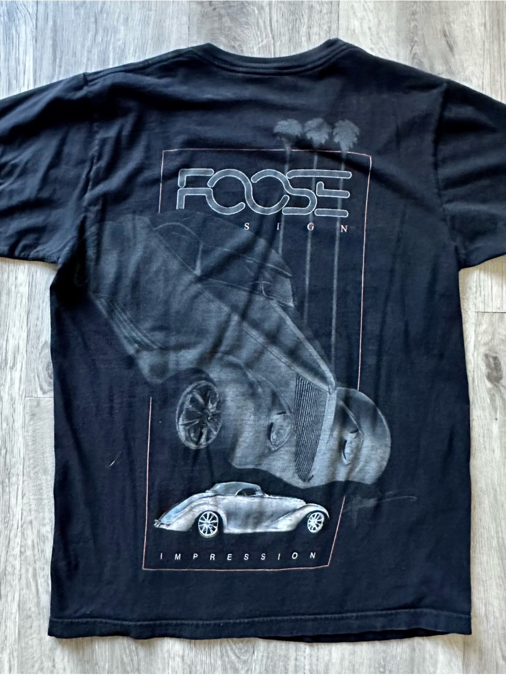 Chip Foose Design Impression Black T-Shirt with graphic of a car